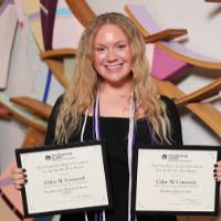 recipient with her award and cord